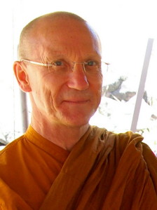 head shot of a smiling monk